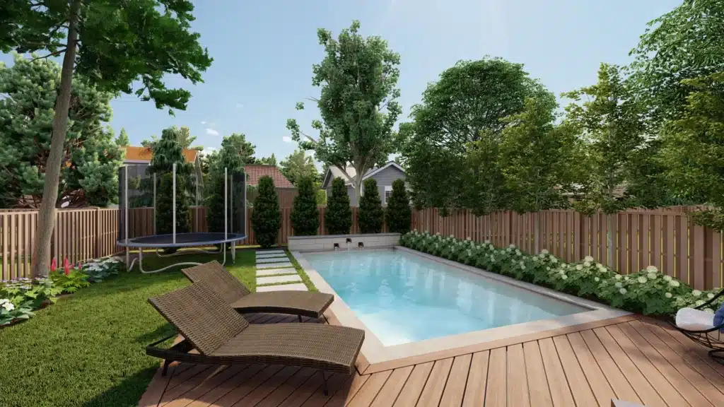 Outdoor backyard swimming pool with lounge chairs and landscaped patio