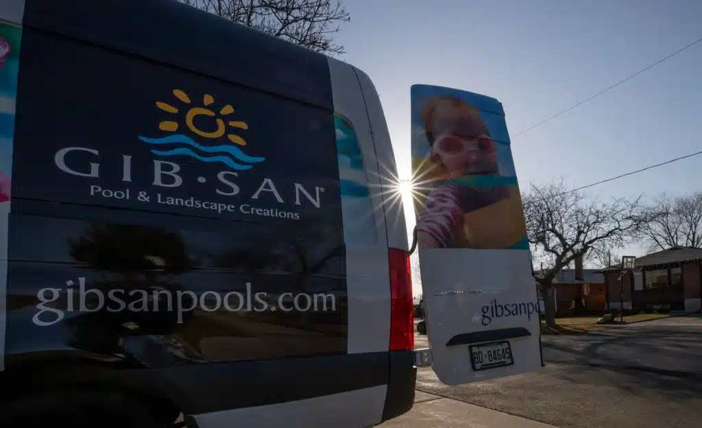 Gib-San Pools service van parked in residential neighbourhood during pool maintenance visit in Ontario.